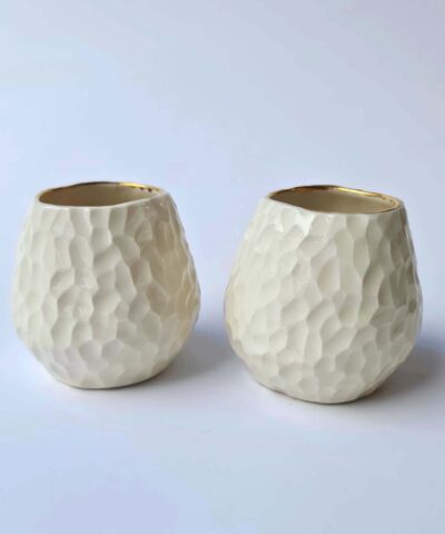 white porcelain and gold cup