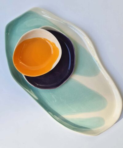 serving set platters and a bowl blue, violet, orange