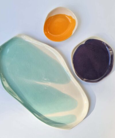 serving set platters and a bowl blue, violet, orange