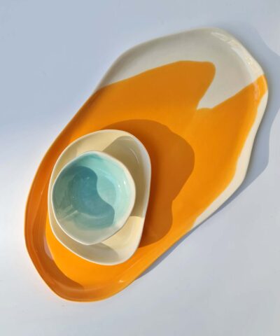 serving set platters and a bowl orange, ivory, blue
