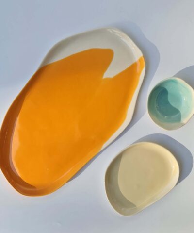 serving set platters and a bowl orange, ivory, blue