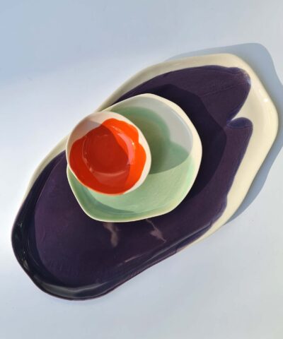 serving set platters and a bowl green, red, violet