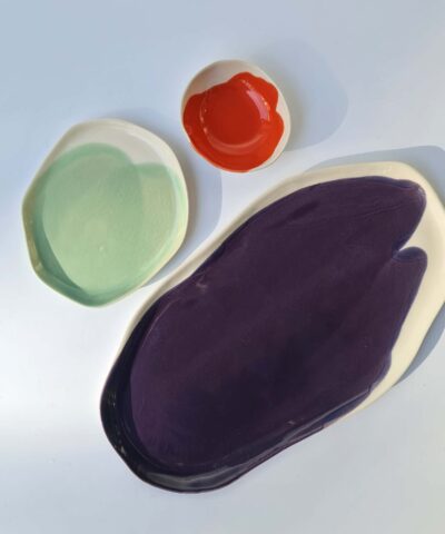 serving set platters and a bowl green, red, violet