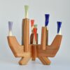 walnut wood and colorful porcelain candelabra