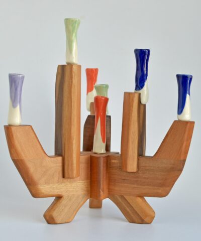 walnut wood and colorful porcelain candelabra