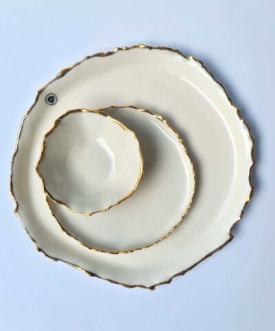 white porcelain and gold plates set