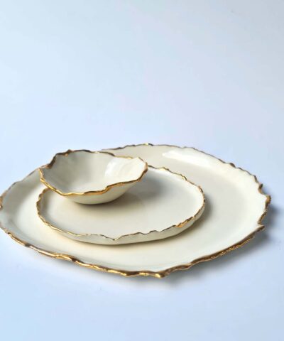white porcelain and gold plates set