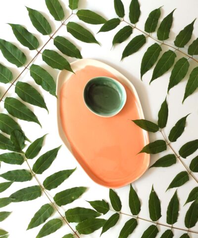 pink and forest green ceramic trays