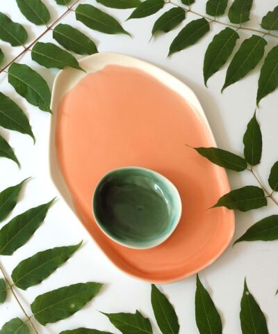 pink and forest green ceramic trays