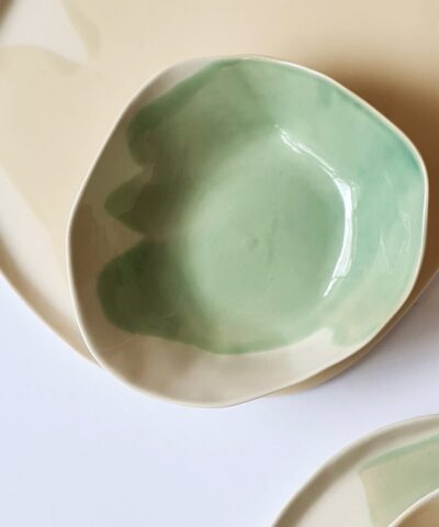 set of colorful porcelain plates