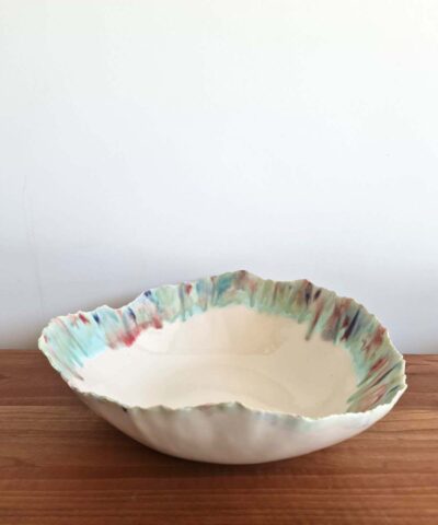 Porcelain bowl in blue, turquoise and corela colors