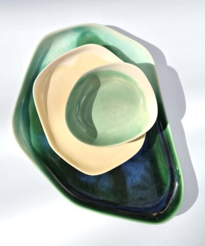 porcelain platters in green and ivory