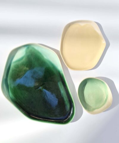 porcelain platters in green and ivory
