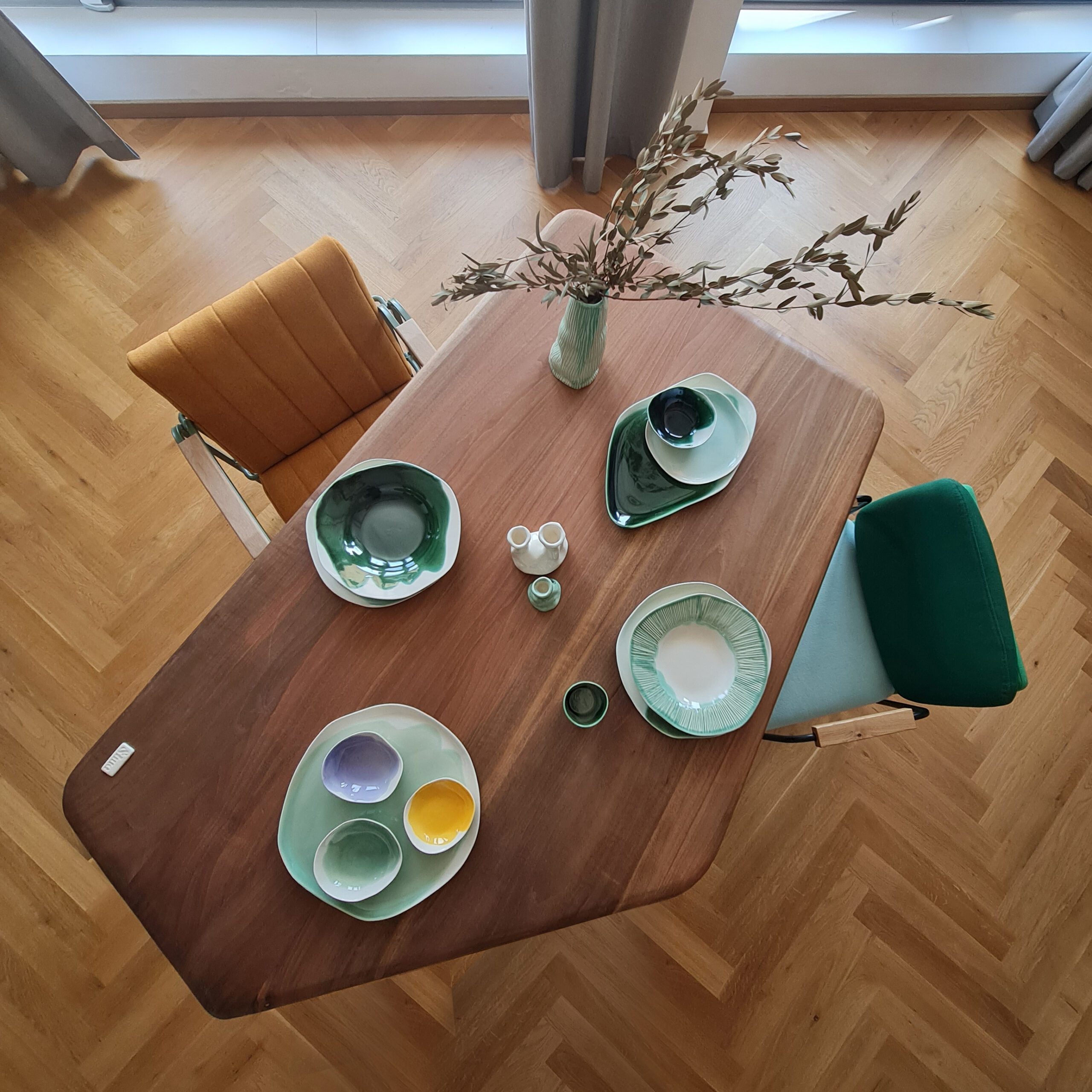 walnut wood table porcelain dishes two chairs